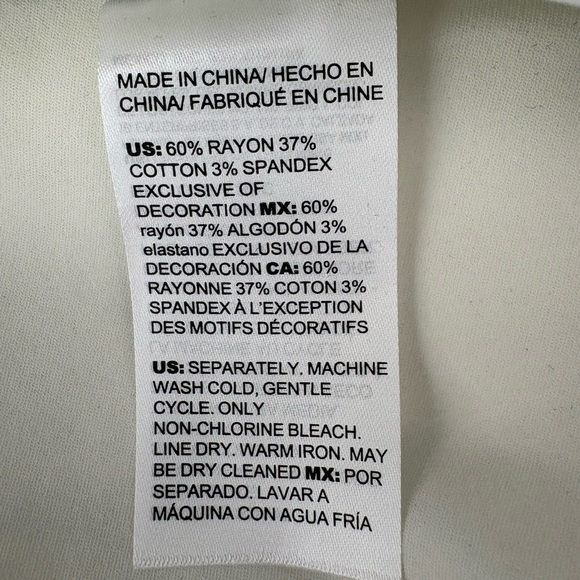 Chico's So-Slimming Black and White Patterned Ankle Pants with Pom Pom Details - Picture 8 of 9